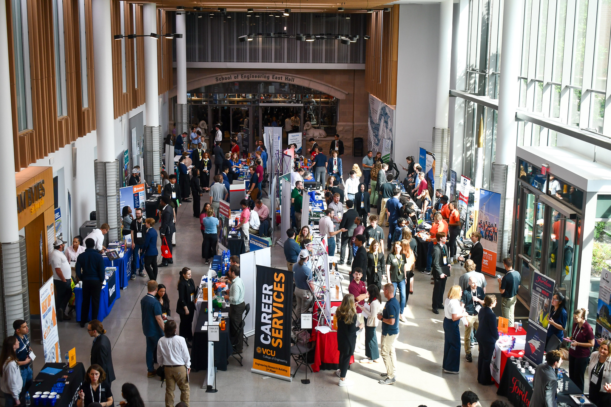 Photo from top of the breezeway in the College of Engineering building during a career fair event.
